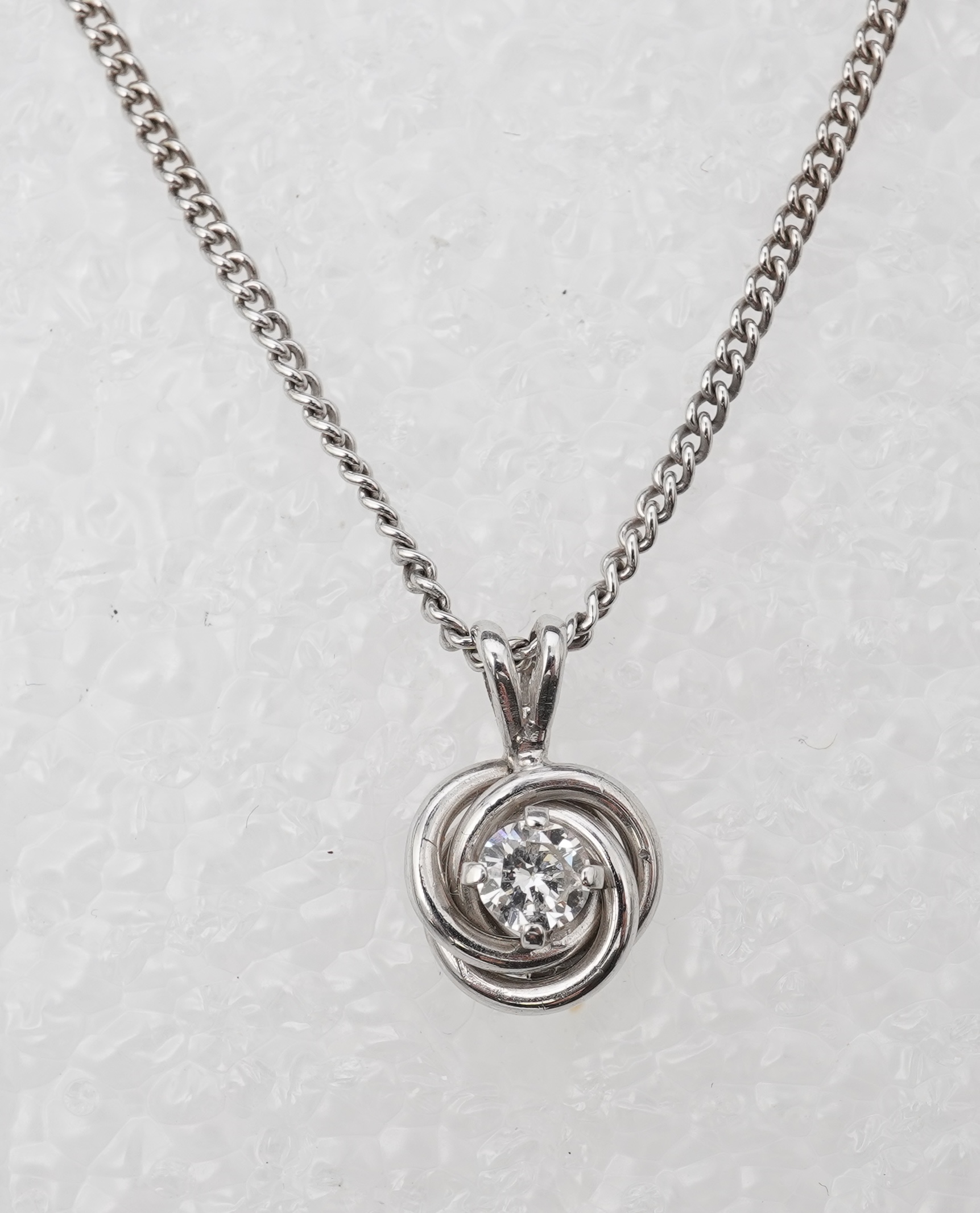 A diamond pendant necklace